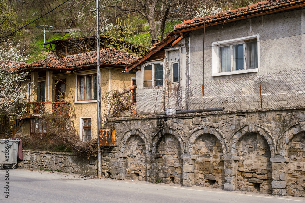 Veliko Tarnovo city, Bulgaria - March 24, 2017. Traditional Bulgarian architecture in the old medieval town area, Veliko Tarnovo city, Bulgaria