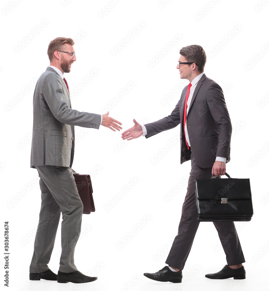two business men holding out their hands towards each other two business men holding out their hands towards each other