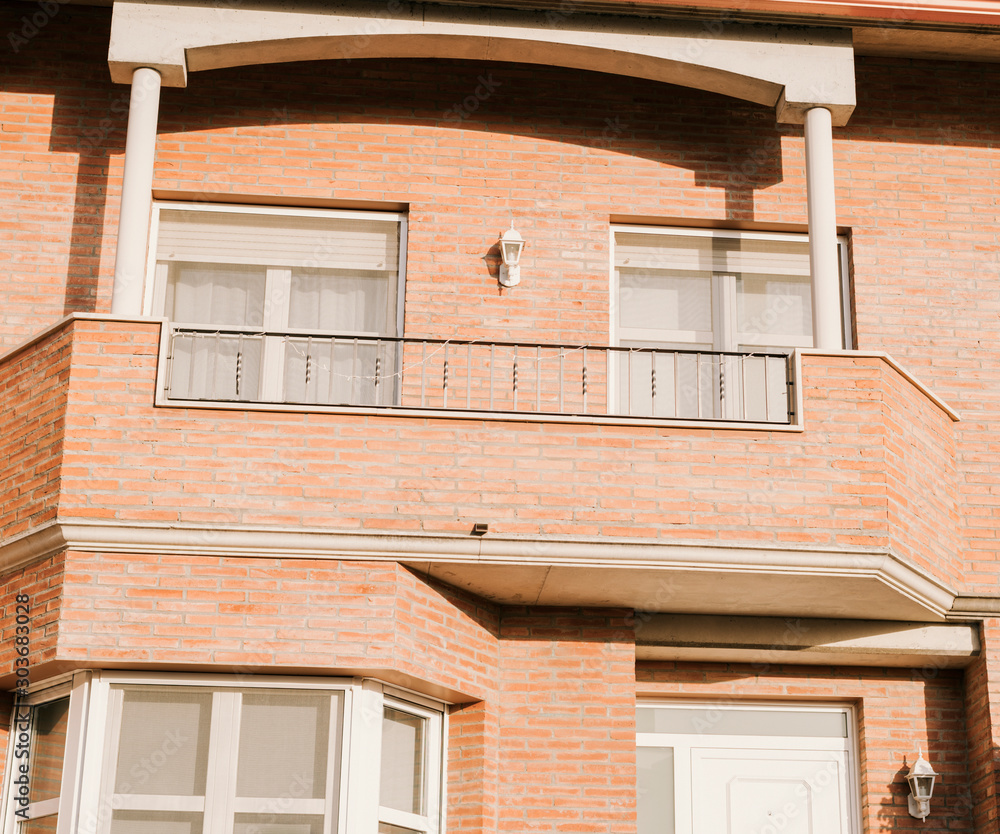 Facade of a terraced house with two floors. Facade of a terraced house with two floors.