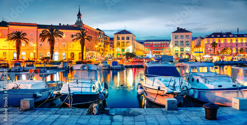 Colorful evening cityscape of Split town.Splendid summer sunset in Croatia, Europe. Beautiful world of Mediterranean countries. Traveling concept background. photo