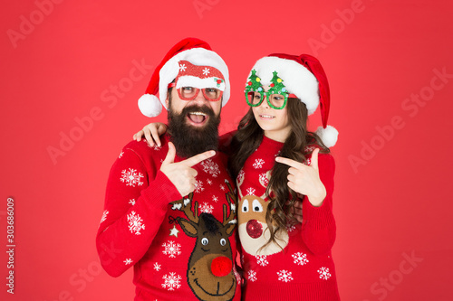 Bearded man and kid. Family celebrate holiday. Family tradition. Togetherness. Merry christmas. Joyful cheerful people. Father and daughter winter sweaters celebrate new year. Happy family hug