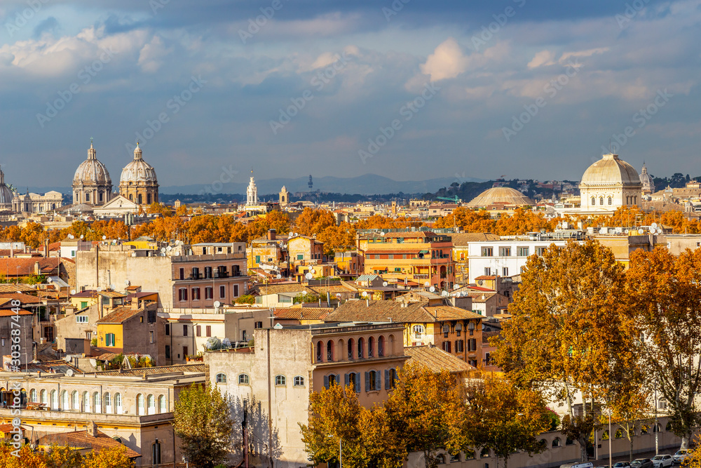 Rome, Italy city view from the Orange Trees Garden or Savello Park under overcast November sky