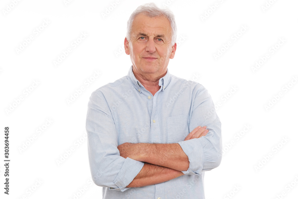 Portrait of older man in grey shirt looking at camera. Portrait of older man in grey shirt looking at camera.
