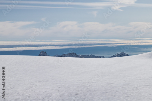 Mountains in winter beyond the horizon