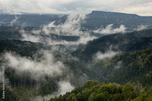 low clouds in the sandstone mountains of the czech republic