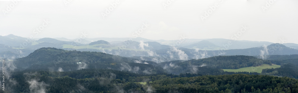 low clouds in the sandstone mountains of the czech republic