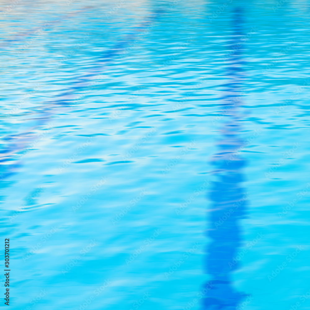 Blue water and laens in swimming pool