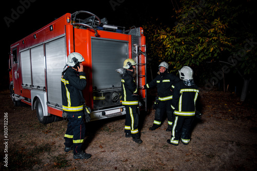 Fire brigade in action at night time