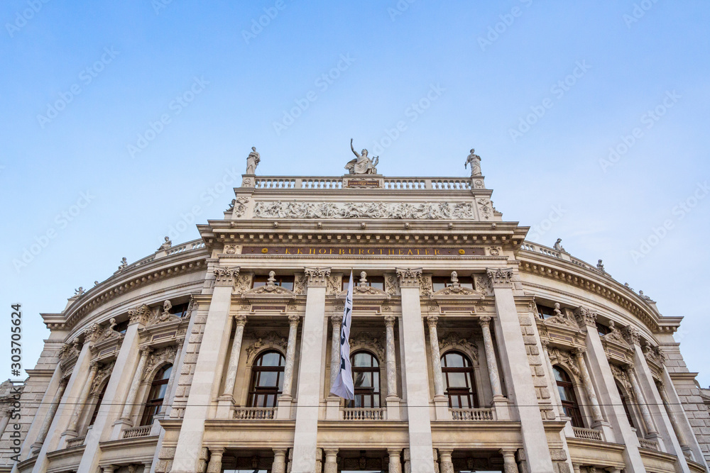 Main facade of the Burgtheater theatre in the city center of Vienna, Austria, with its typical Baroque Austro hungarian facade. It is one of the main theatres and operas of Austrian capital city