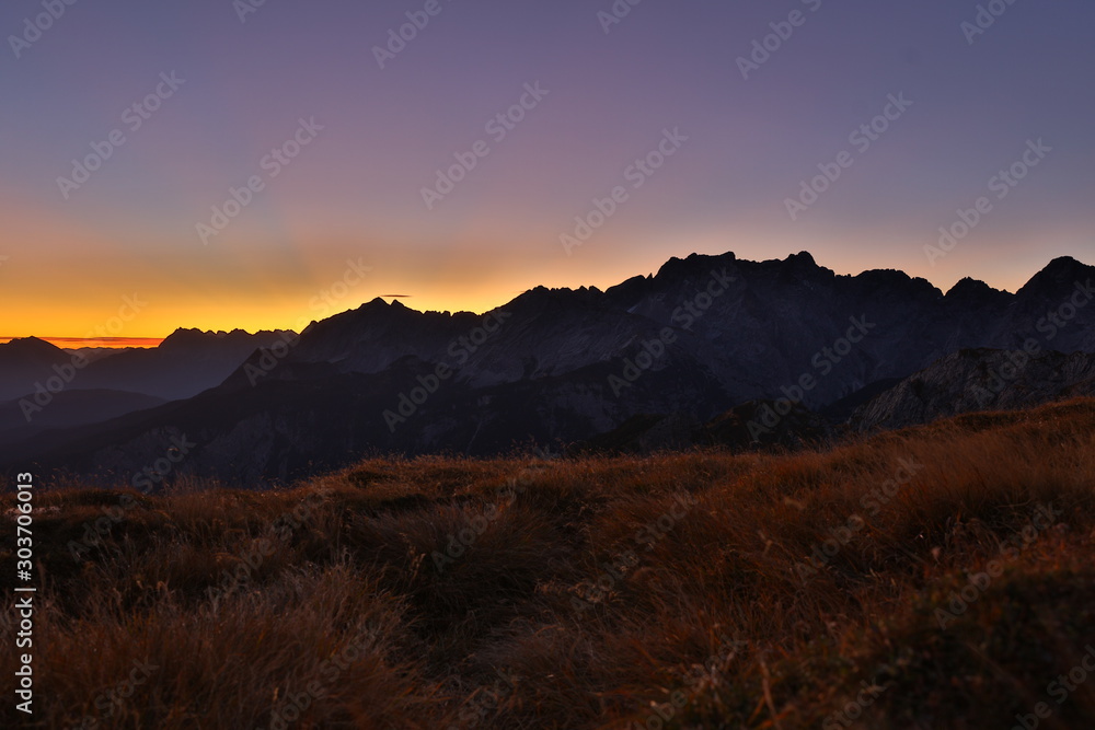 NB__0037 Sunrise above mountain range in the Alps