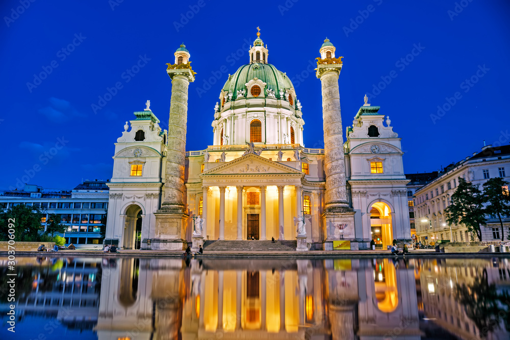 Famous Karlskirche at night in Vienna, Austria - obrazy, fototapety, plakaty 