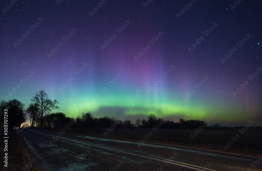 bright aurora in russia, outside the city