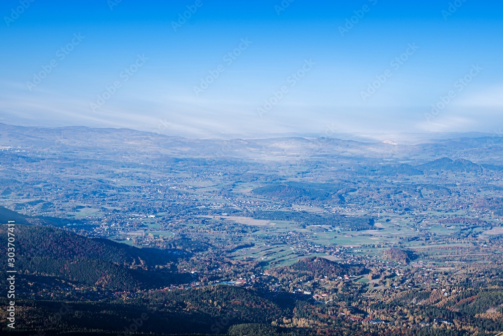 Aerial view of houses  . picturesque mountains . Foggy landscape, Poland, Europe . From height of bird's flight