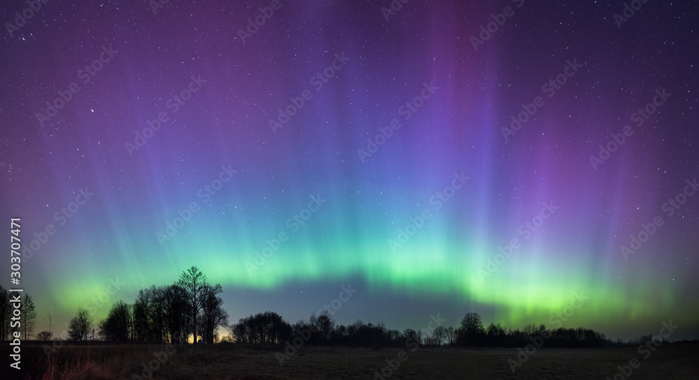 bright aurora in russia, outside the city