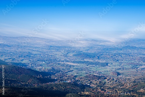 Aerial view of houses . picturesque mountains . Foggy landscape, Poland, Europe . From height of bird's flight