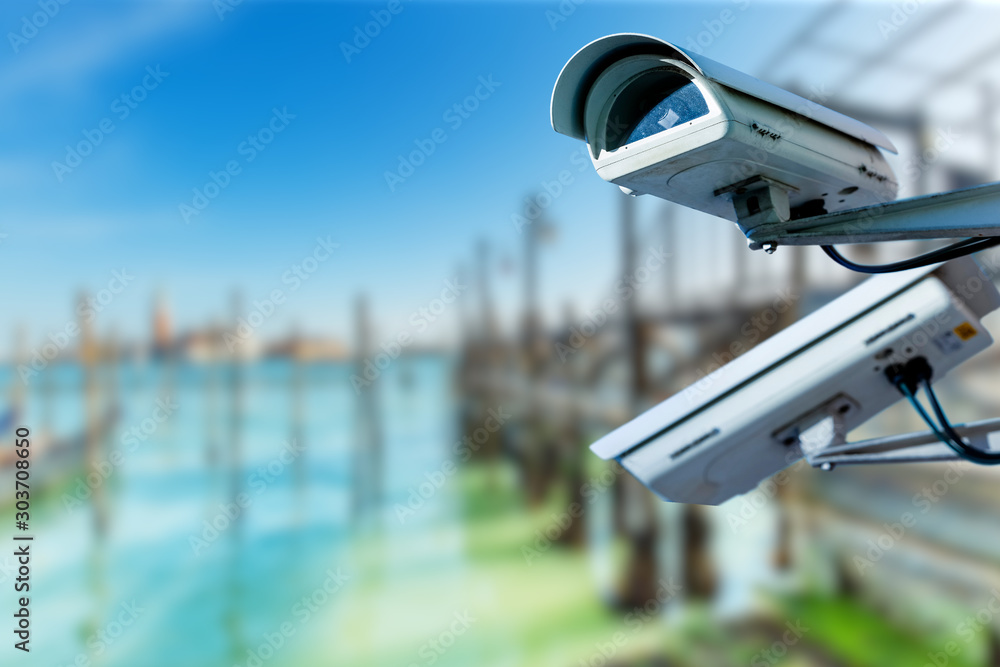 CCTV camera concept with lagoon near in venice on background CCTV camera concept with lagoon near in venice on background
