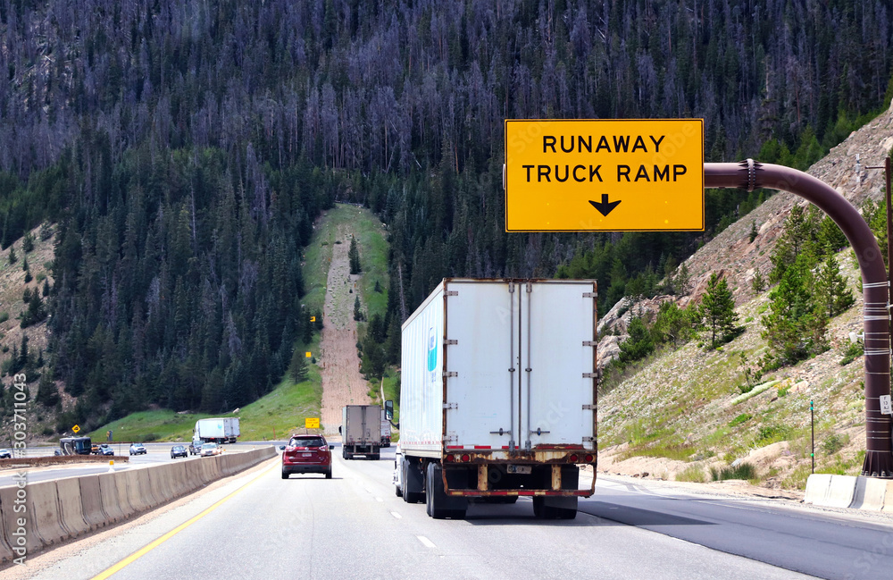 Φωτογραφία Runaway truck ramp alongside a steep downhill highway in the mountains