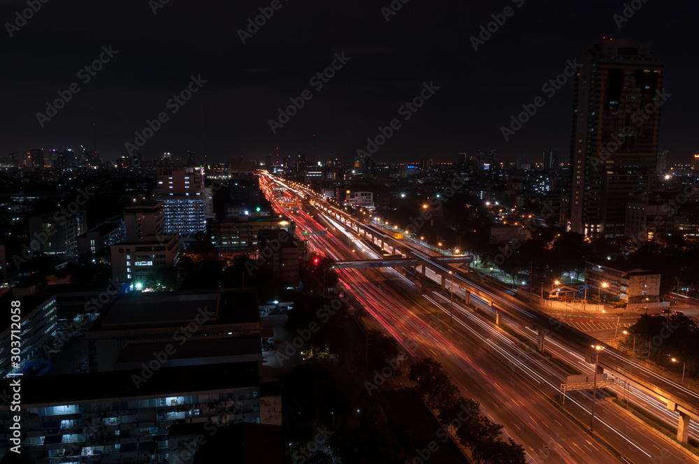 Bangkok night view with skyscraper in business district in Bangkok Thailand