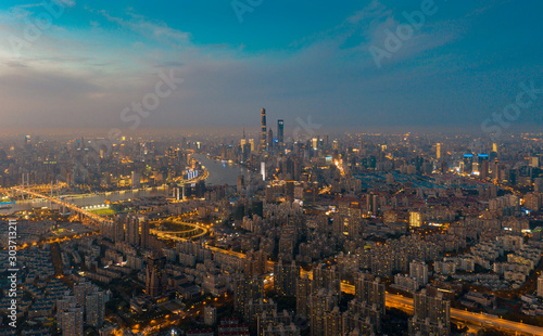 Panoramic aerial view of the night view at dusk in Shanghai, China © Weiming