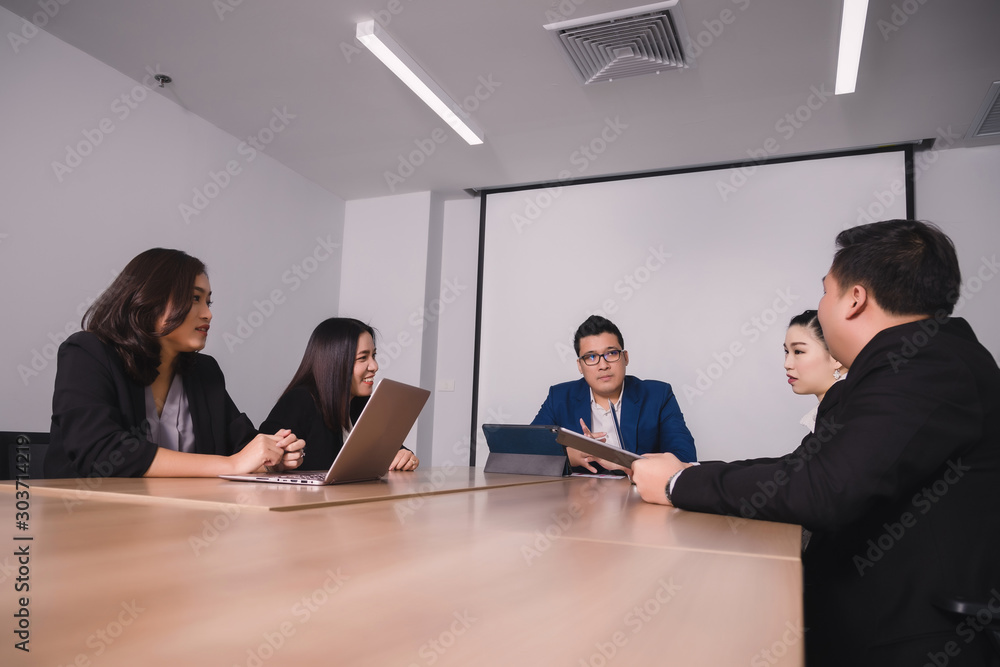 Business people in seminar room. Meeting Corporate Success Brainstorming Teamwork Business people in seminar room. Meeting Corporate Success Brainstorming Teamwork