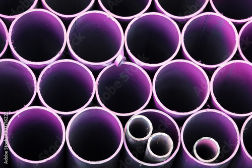 stack of colorful metal pipe background