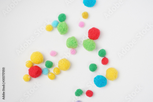 Colorful cotton balls for Montessori called Pom pom ball - Isolated white background