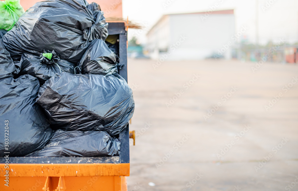 Trash is made of large colored steel with many garbage bags. Trash is made of large colored steel with many garbage bags.