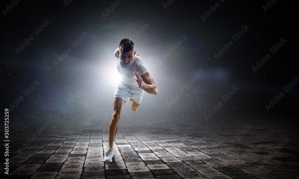 Sportsman running race. Mixed media Sportsman running race. Mixed media