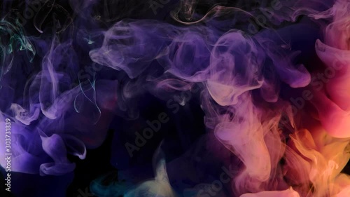 Color paint drops in water , abstract color mix , drop of Ink color mix paint falling on water Colorful ink in water, 4K footage, 