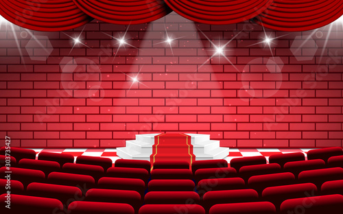 white podium on the stage with red chairs in the hall