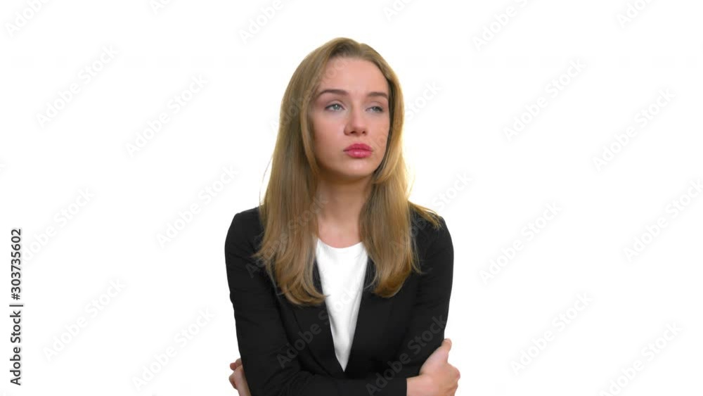 Stressed young business woman with tears in her eyes. Stressed young business woman with tears in her eyes.