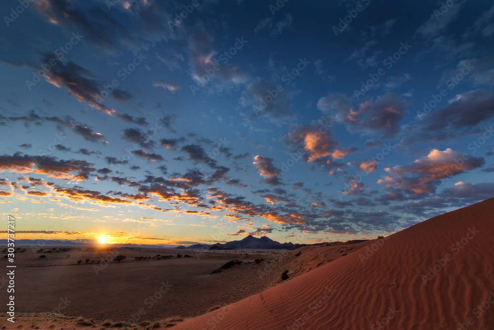 Sunrise over dunes
