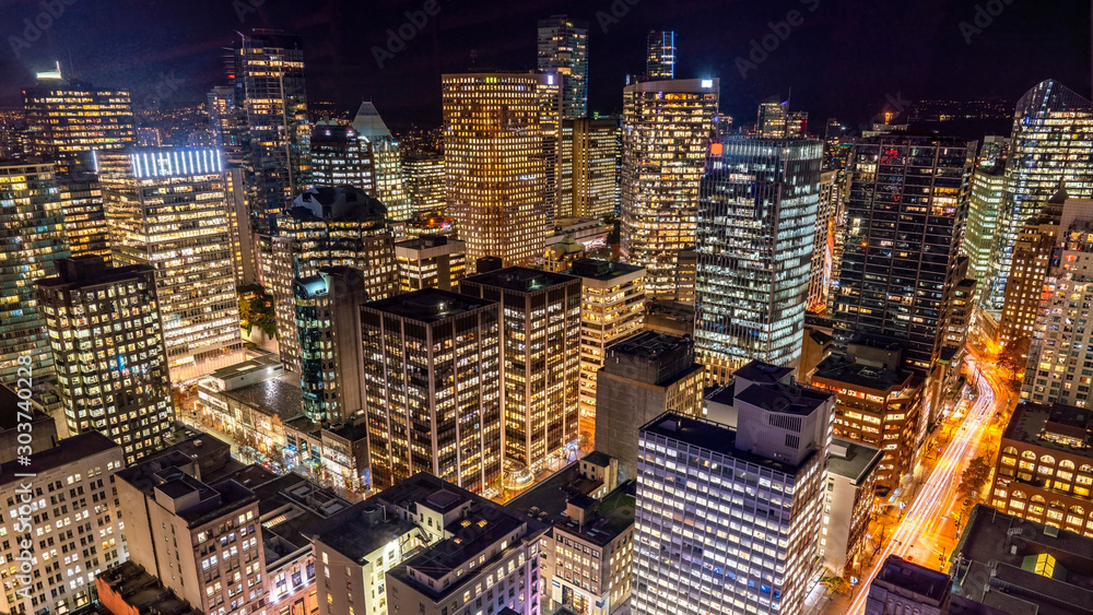 Vancouver, British Columbia, Canada. Aerial city view of  downtown, taken during a chill night after a beautiful sunset.