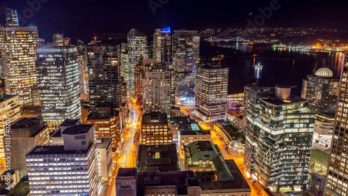 Vancouver, British Columbia, Canada. Aerial city view of  downtown, taken during a chill night after a beautiful sunset. © Daniel Avram