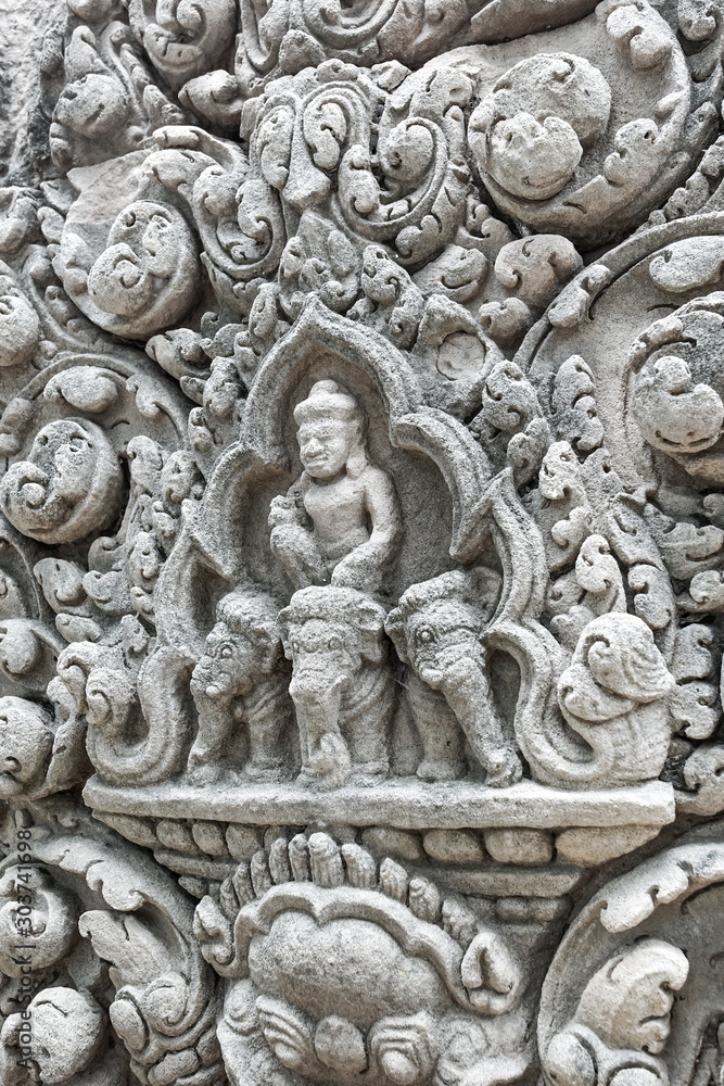 Khmer art sculpture on sand stone in Prasat Muang Tam.