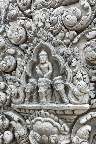 Khmer art sculpture on sand stone in Prasat Muang Tam. © Maicyber