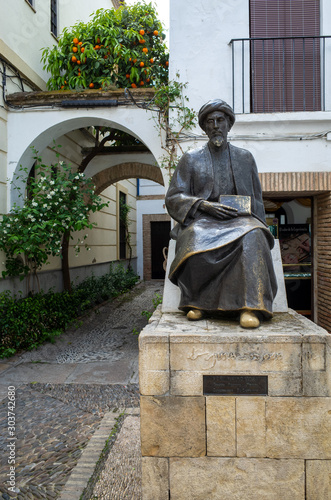 Cordoba, Spain - Apr 10 2019: Bronze statue of Maimonides (1135 - 1204), Jewish rabbi, physician and philosopher in Al Andalus photo