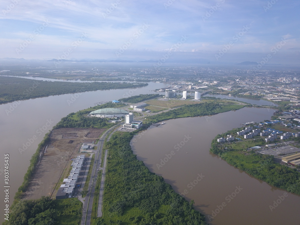 Kuching, Sarawak / Malaysia - November 19 2019: The Kuching Barrage Structure underneath the Bridge along Sarawak River