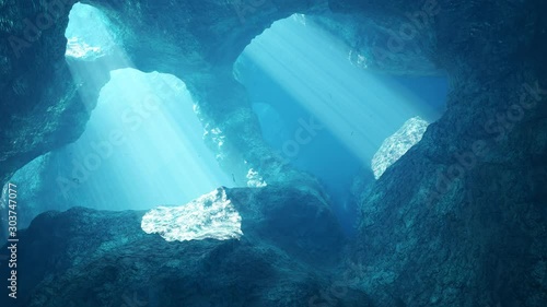 Underwater cave illuminated by sunbeams pouring through a surface opening. 4KHD photo