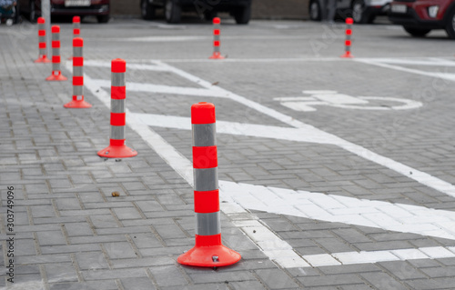 orange Parking columns.Protection on the road, concept