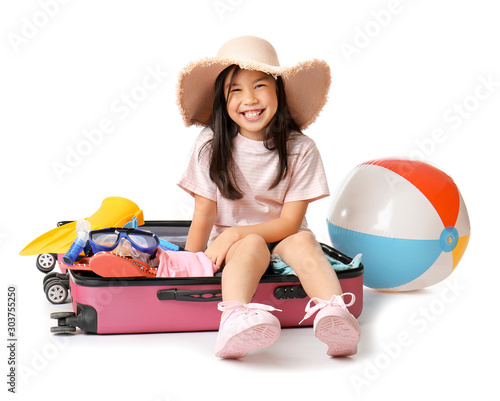 Cute girl with suitcase and...