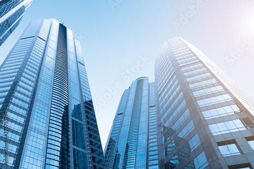Modern skyscrapers glass building business district. © eakgrungenerd