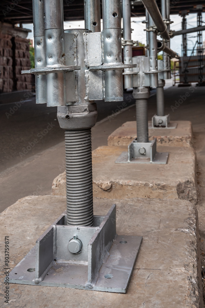 Heavy-duty pylons support a destroyed bridge beam. Heavy-duty pylons support a destroyed bridge beam.