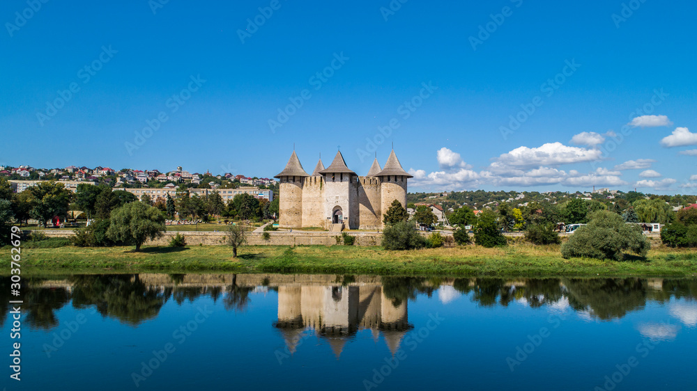 soroca fortress reflected in nistru river shot on drone, historic fort in the Republic of Moldova