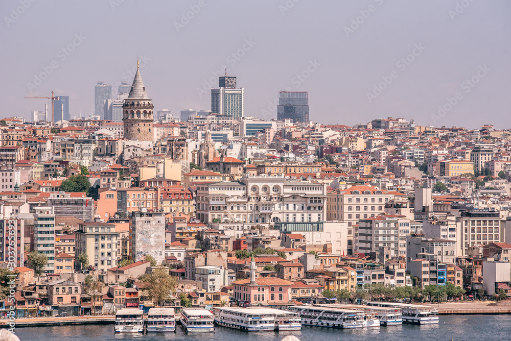 Cityscape of Istanbul at Golden Horn. Panorama of the old town with Galata tower in Karakoy District, Turkey. Touristic Destination in Europe.