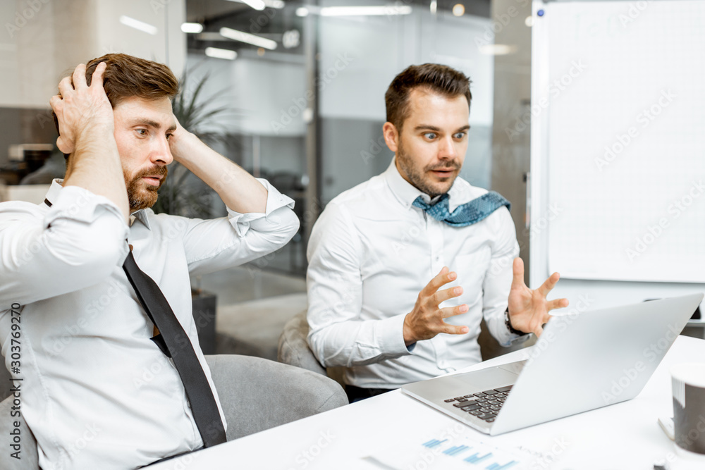Εκτύπωση καμβά Two exhausted and tired employees hard working with laptop in the office, having