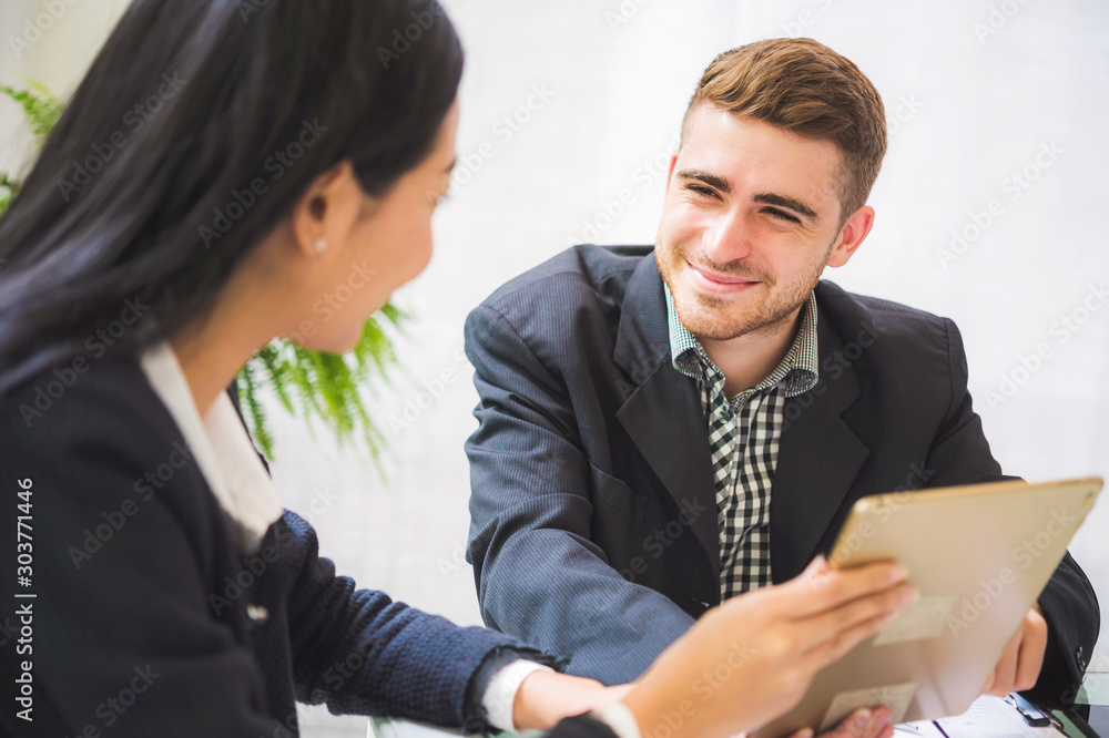 Business woman discuss about financial report to customer, meeting at coffee shop Business woman discuss about financial report to customer, meeting at coffee shop