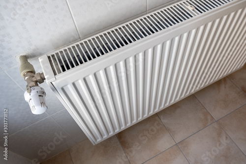 Wallpaper Mural Closeup of heating radiator valve for comfortable temperature regulation on metal radiator on inrerior wall. Torontodigital.ca