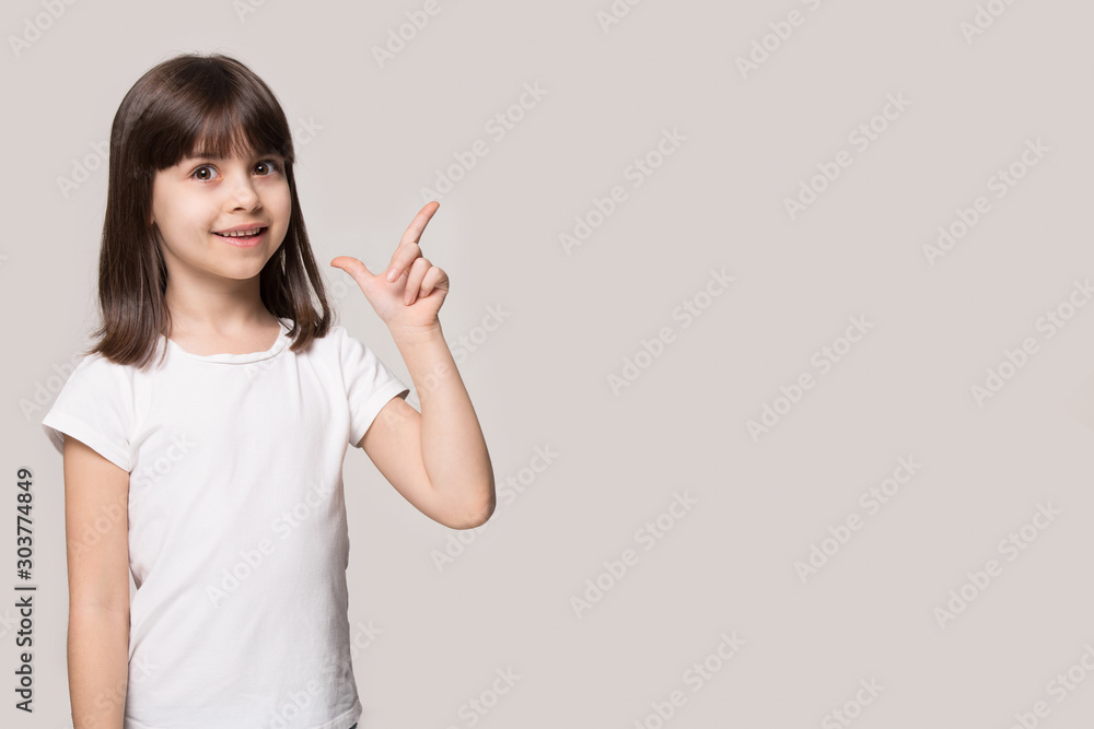 Close up portrait with smiling little brown-haired girl and copy space. Close up portrait with smiling little brown-haired girl and copy space.