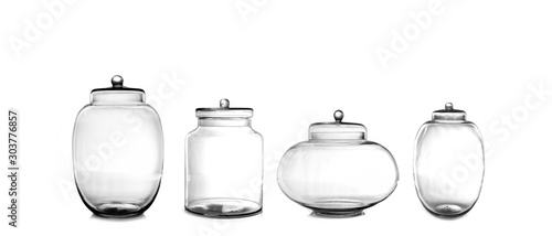 Leinwand Poster Empty glass jars isolated on white background
